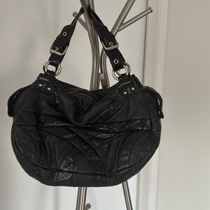 Cynthia Rowly ladies, black leather and patent leather pocketbook gently used